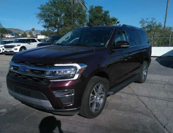 Used 2024 Red Metallic Ford Limited image 1