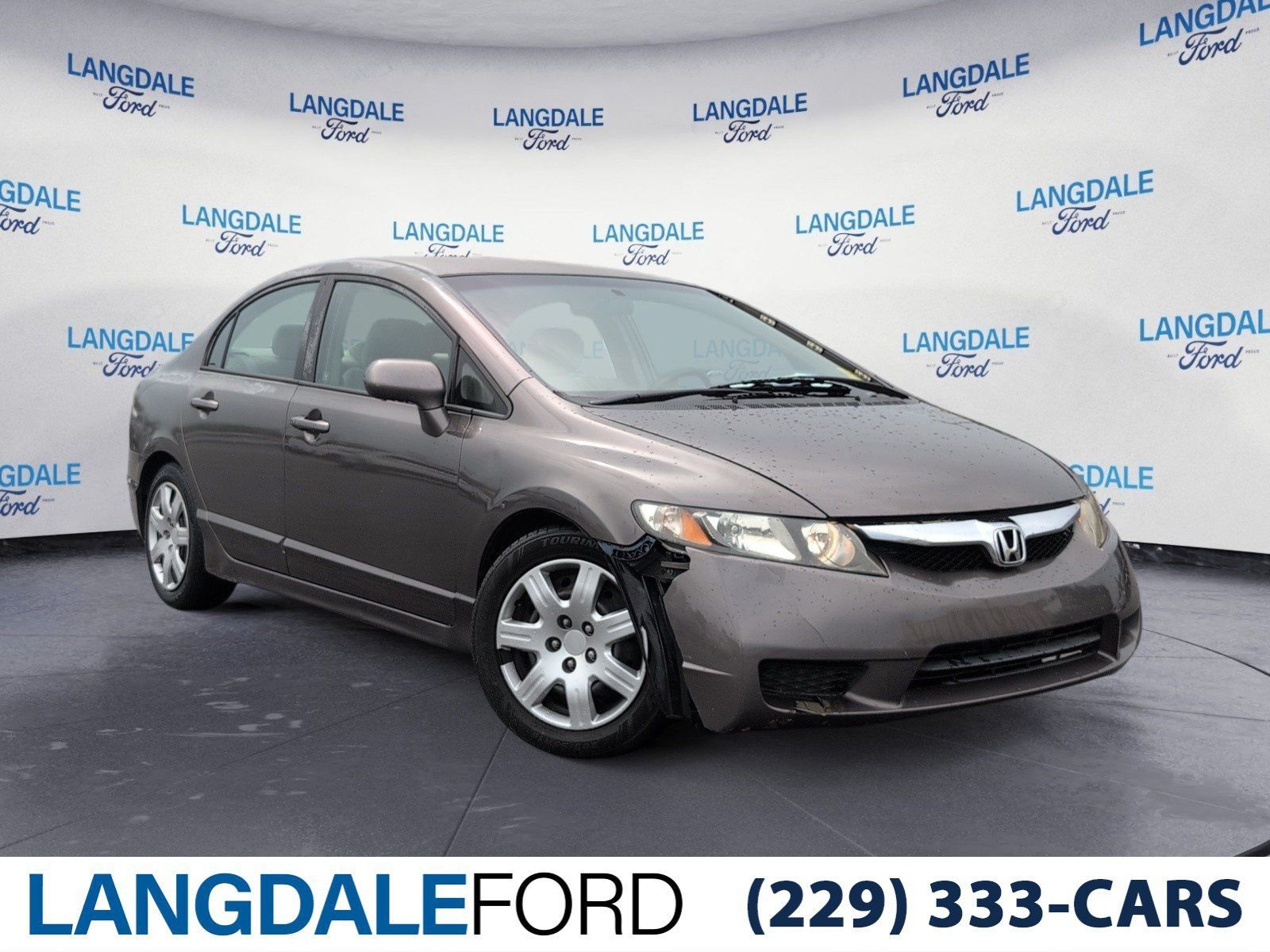 Used 2011 Champagne Honda LX image 1