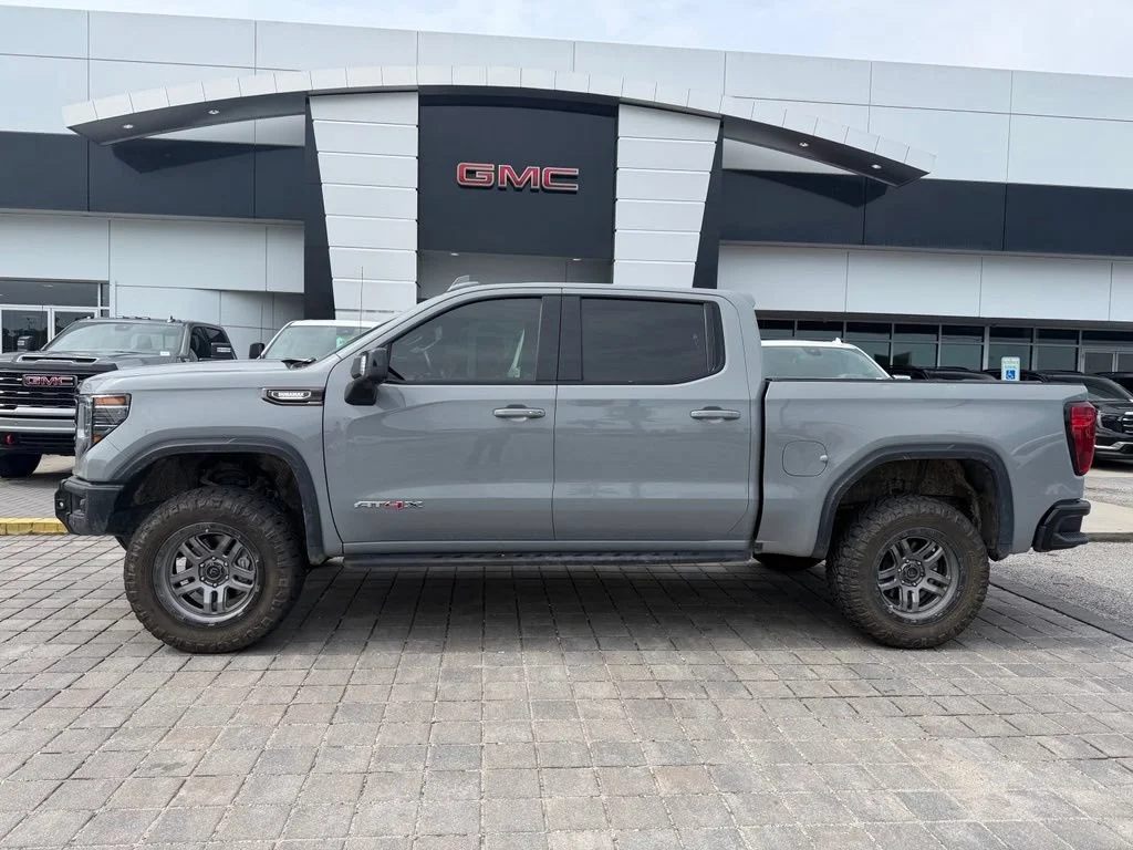 Used 2024 Thunderstorm Gray GMC AT4X image 1
