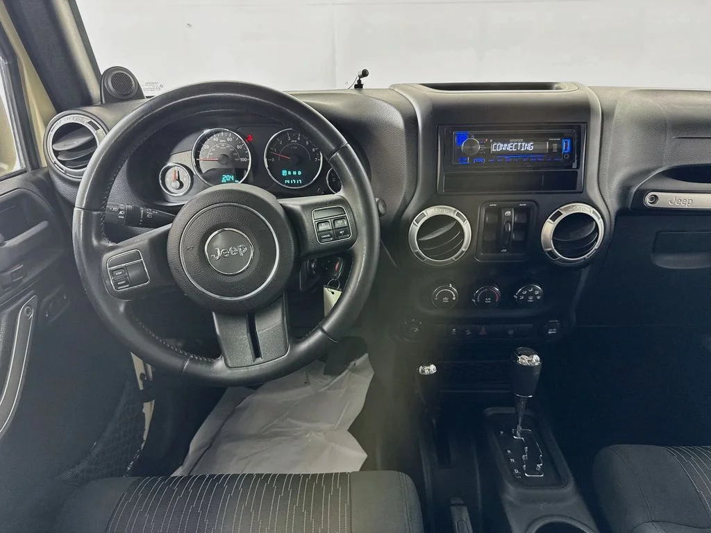 Used 2012 Beige Jeep Unlimited Sahara image 24