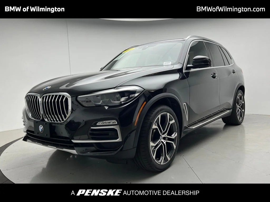 Used 2021 Black BMW sDrive40i image 1