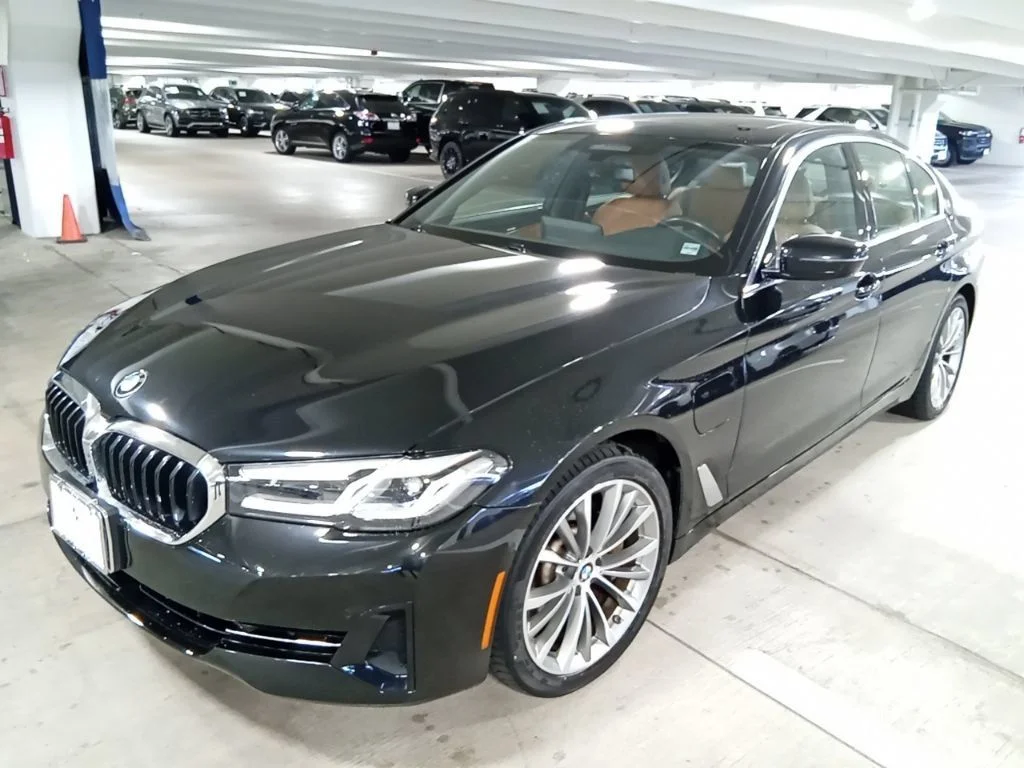 Used 2021 Black Sapphire Metallic BMW 530e iPerformance image 1