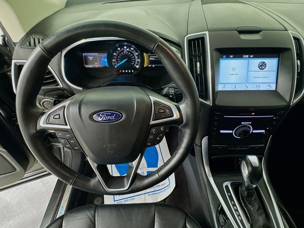 Used 2016 Gray Metallic Ford Titanium image 12