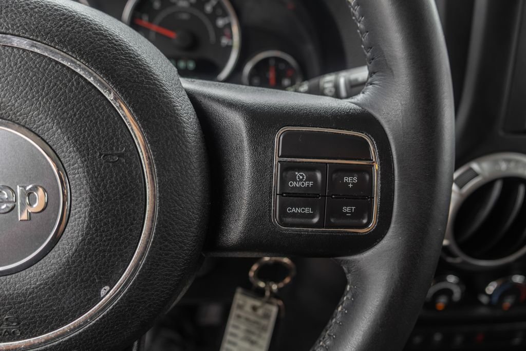 Used 2017 Black Jeep Unlimited Sahara image 24