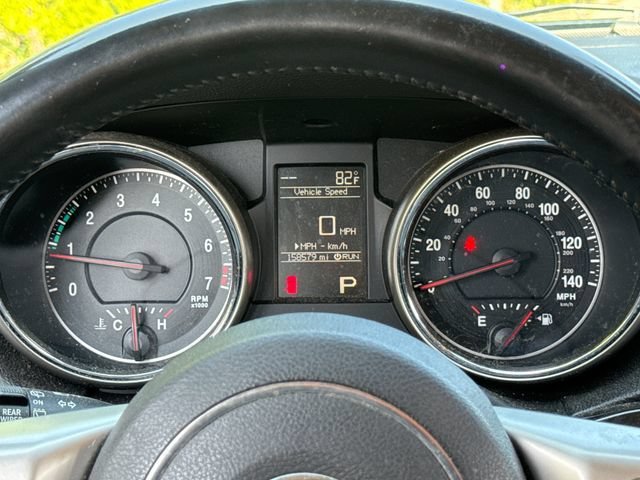 Used 2011 Blackberry Pearlcoat Jeep Laredo image 13