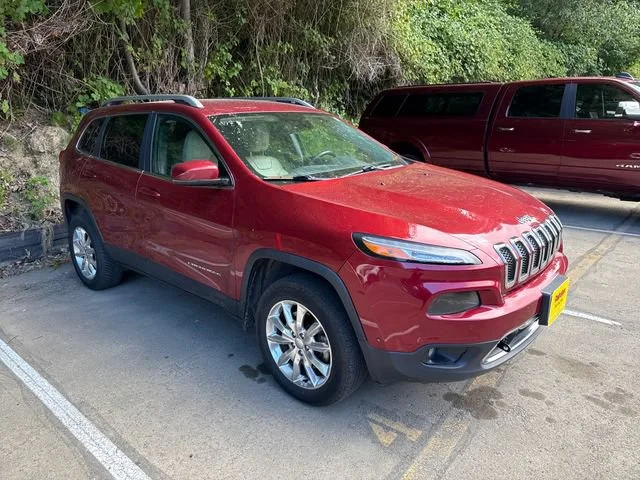 Used 2015 Deep Cherry Red Crystal Pearlcoat Jeep Limited image 1