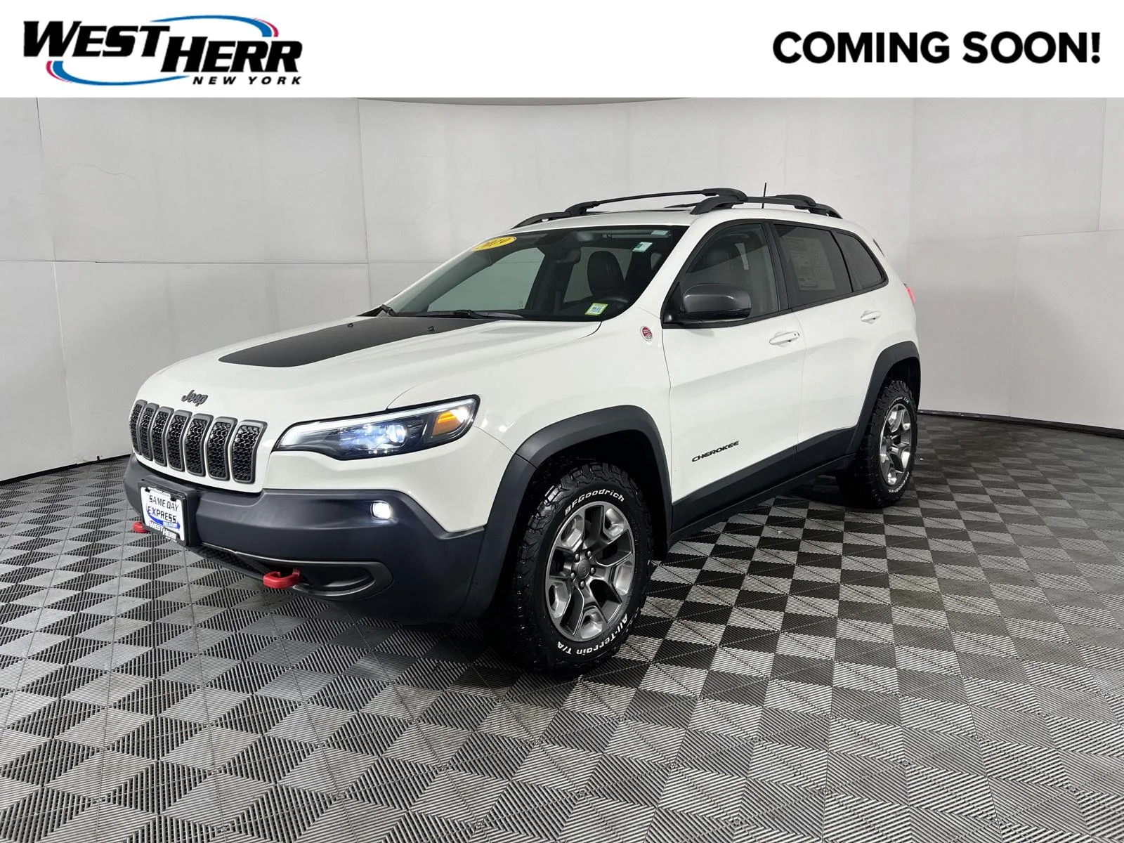 Used 2019 Pearl White Jeep Trailhawk Elite image 1