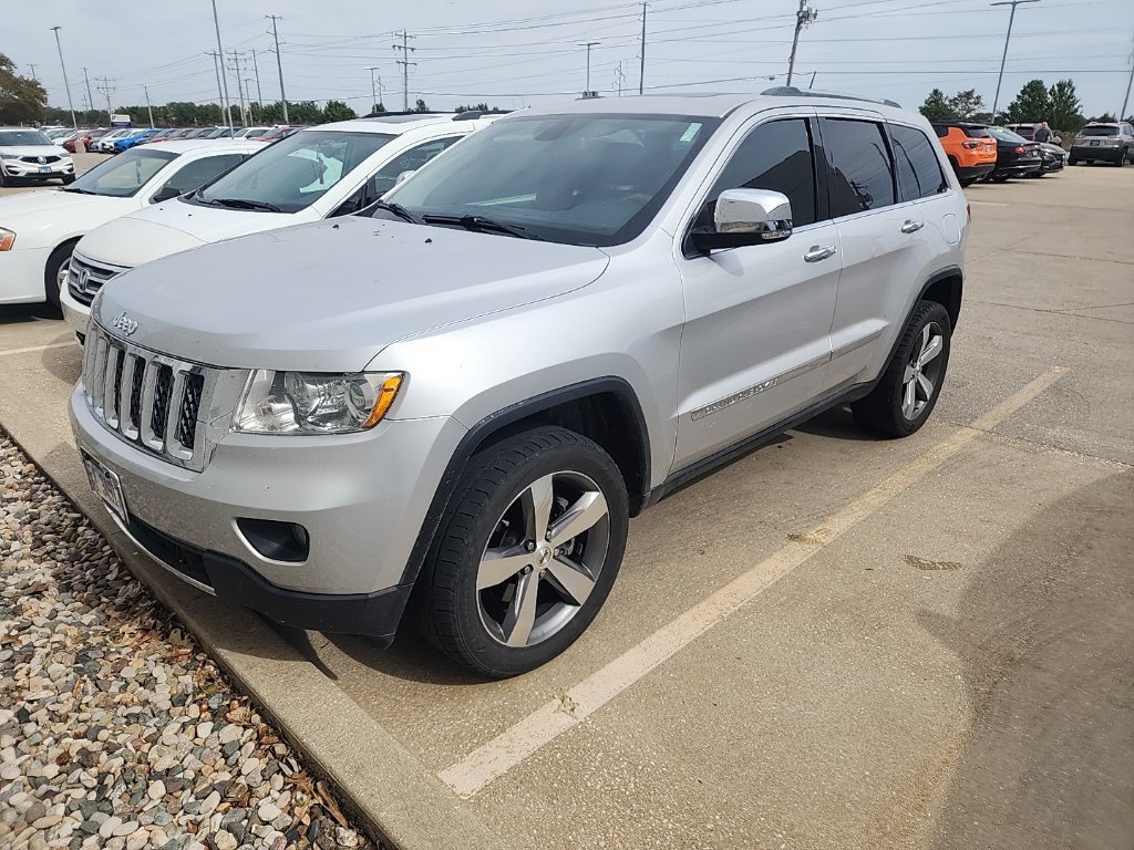 Used 2011 Bright Silver Metallic Clearcoat Jeep Overland image 1