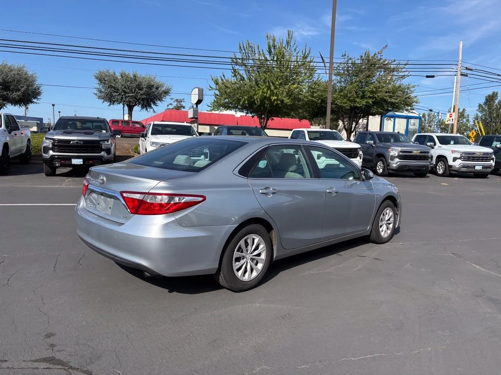 Used 2015 Celestial Silver Metallic Toyota LE image 4