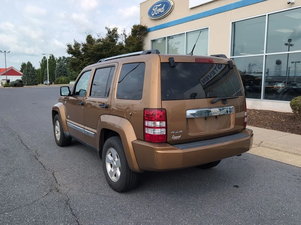 Used 2011 Brown Jeep Sport image 7