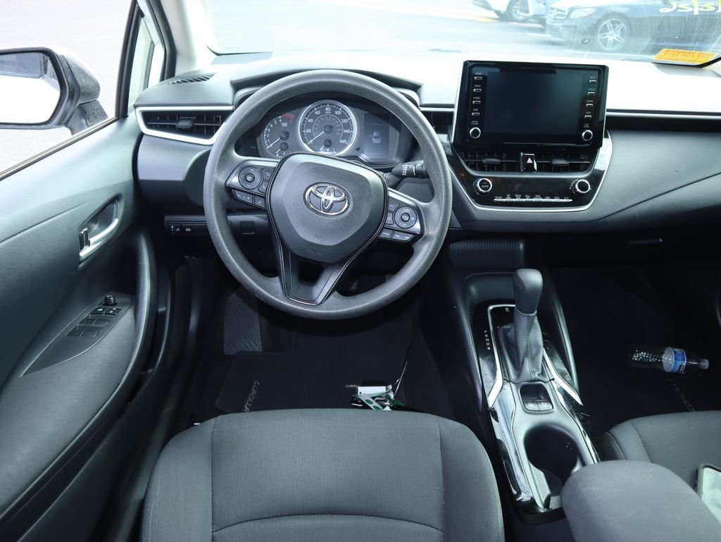 Used 2020 Super White Toyota LE image 6