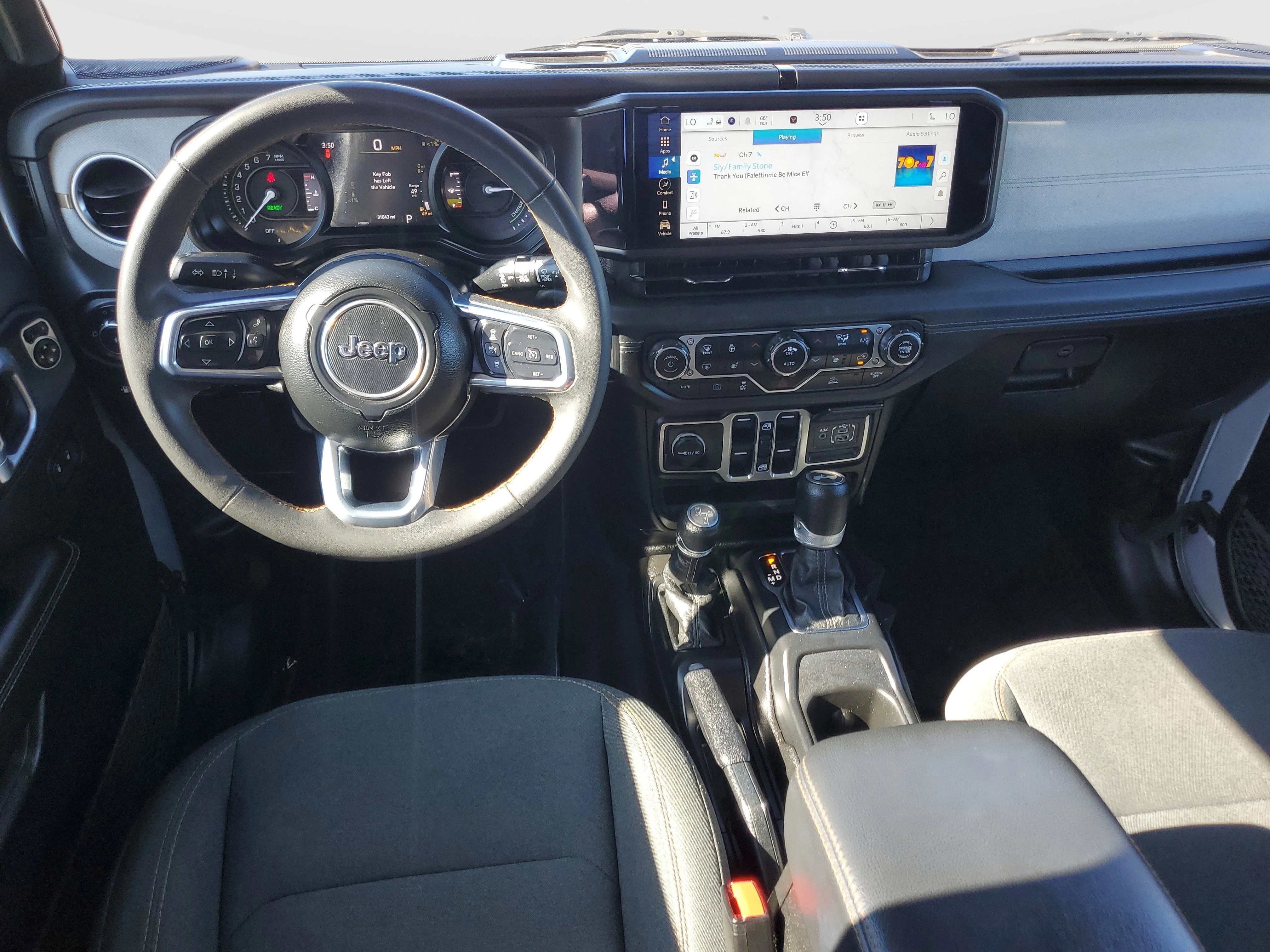 Used 2024 Silver Jeep Sahara 4xe image 14