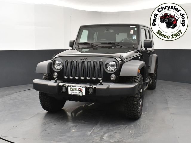 Used 2017 Jeep Wrangler Unlimited Willys Wheeler with VIN 1C4HJWDG6HL715417 for sale in Burnsville, Minnesota