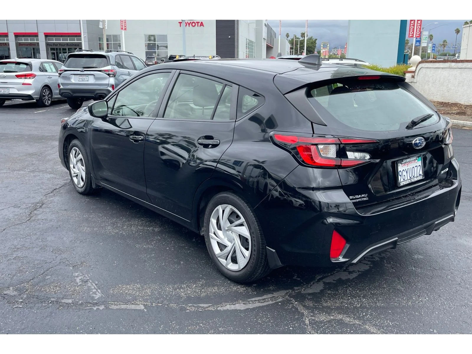 Used 2024 CRYSTAL BLACK SIL Subaru Base image 3