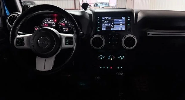 Used 2014 Blue Jeep Unlimited Sahara image 26