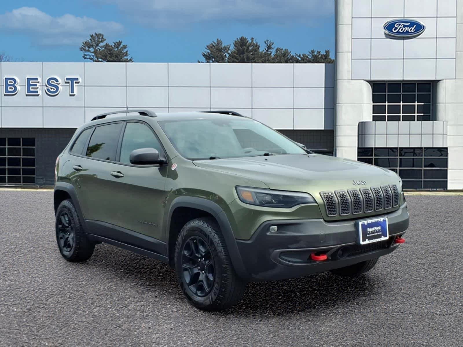 Used 2021 Olive Green Pearlcoat Jeep Trailhawk image 9