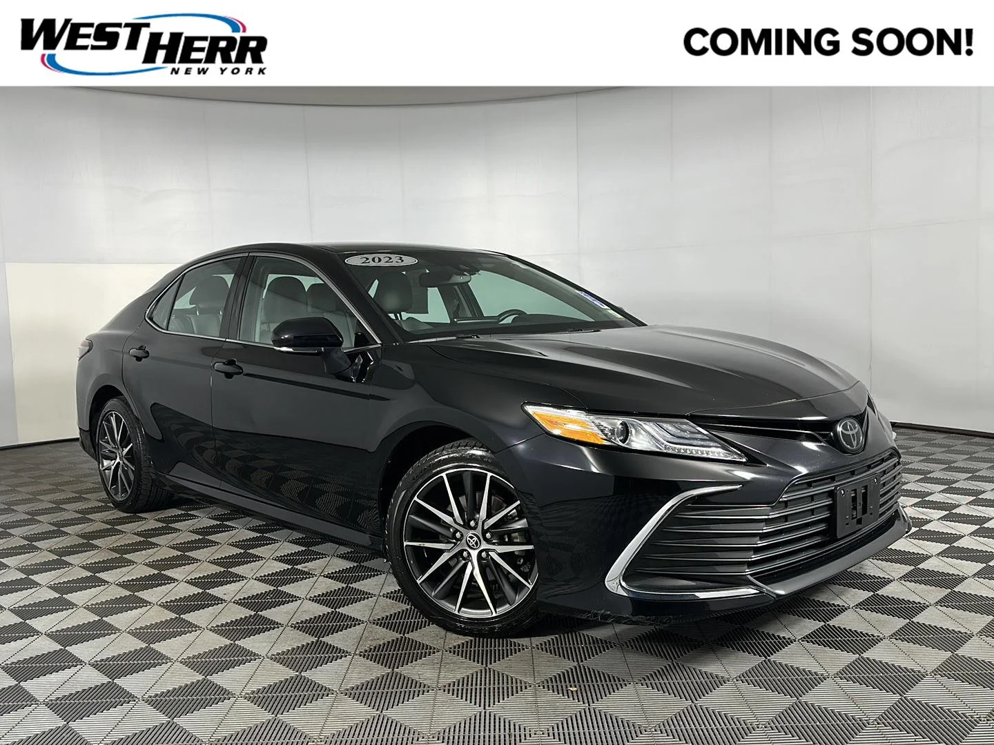 Used 2023 Midnight Black Metallic Toyota XLE image 1