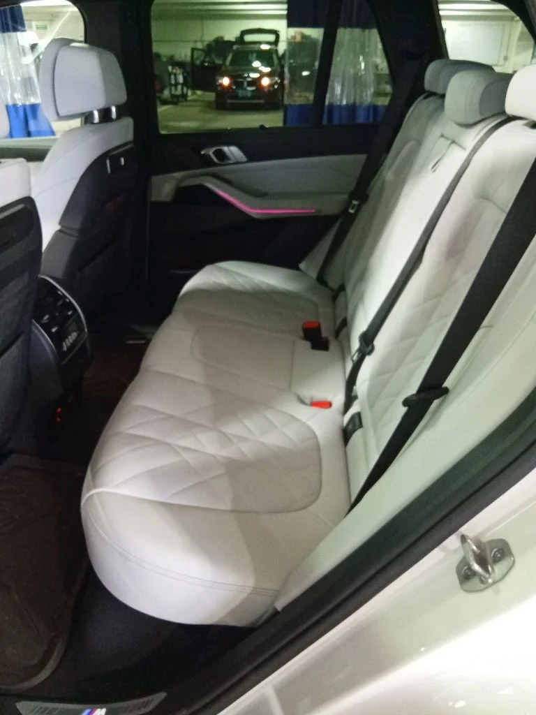 Used 2025 Mineral White Metallic BMW xDrive50e image 10