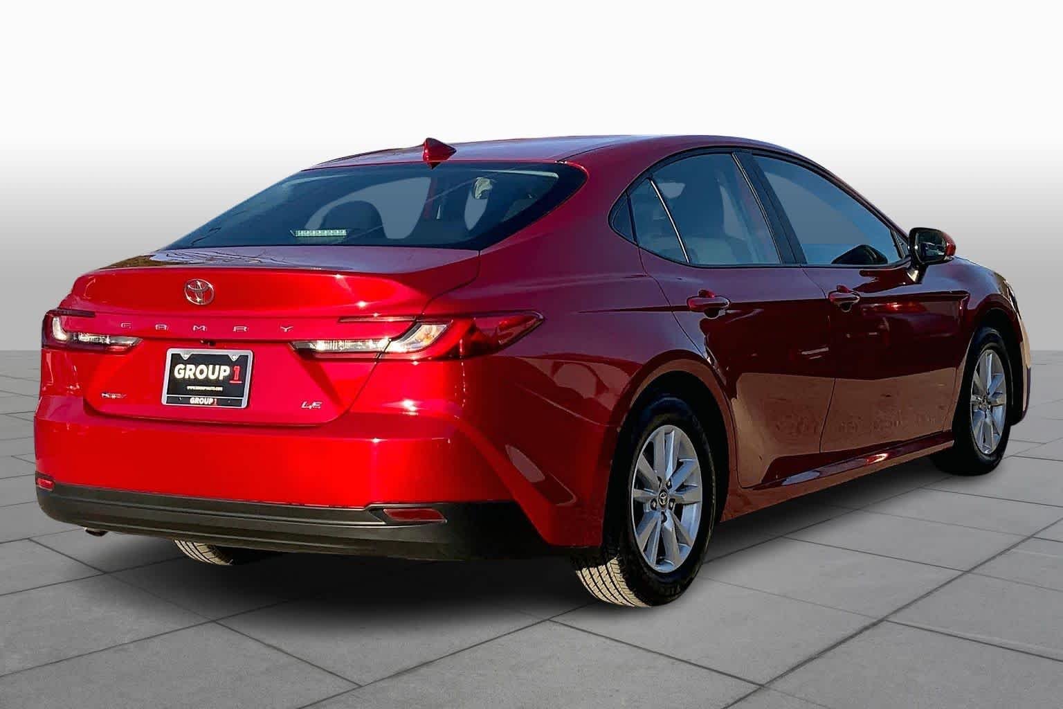 Used 2025 Supersonic Red Toyota LE image 13