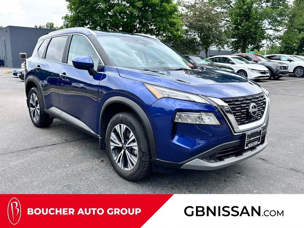 Used 2023 Caspian Blue Metallic Nissan SV image 1
