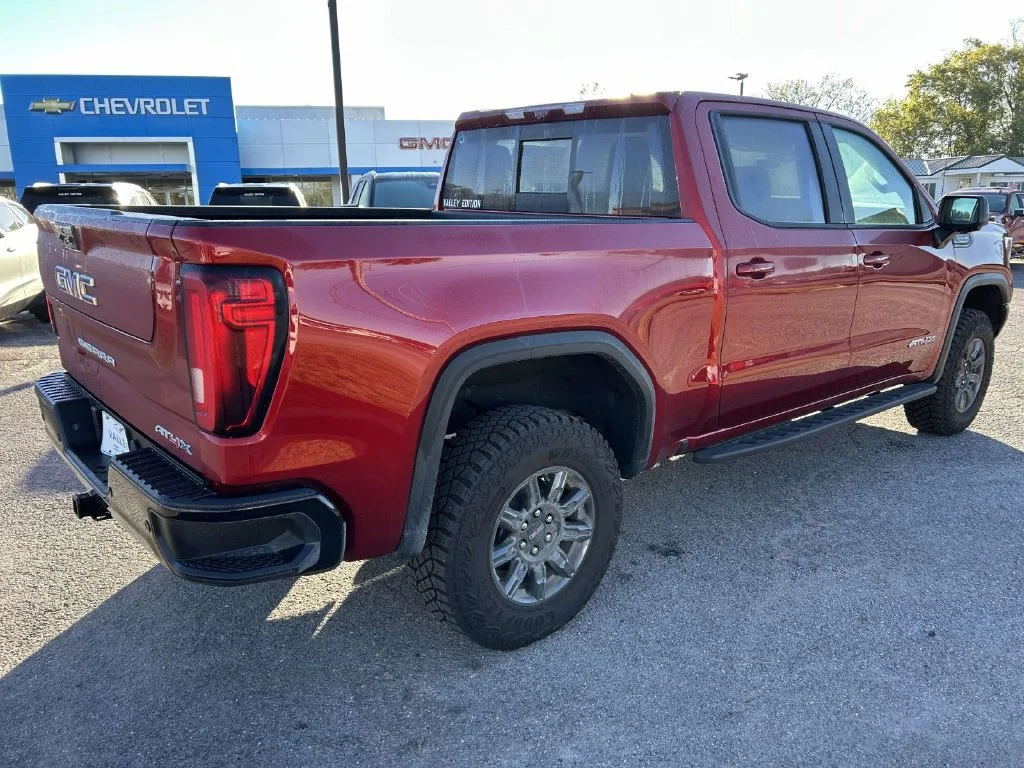New 2026 VOLCANIC RED TINTCOAT GMC AT4X image 4