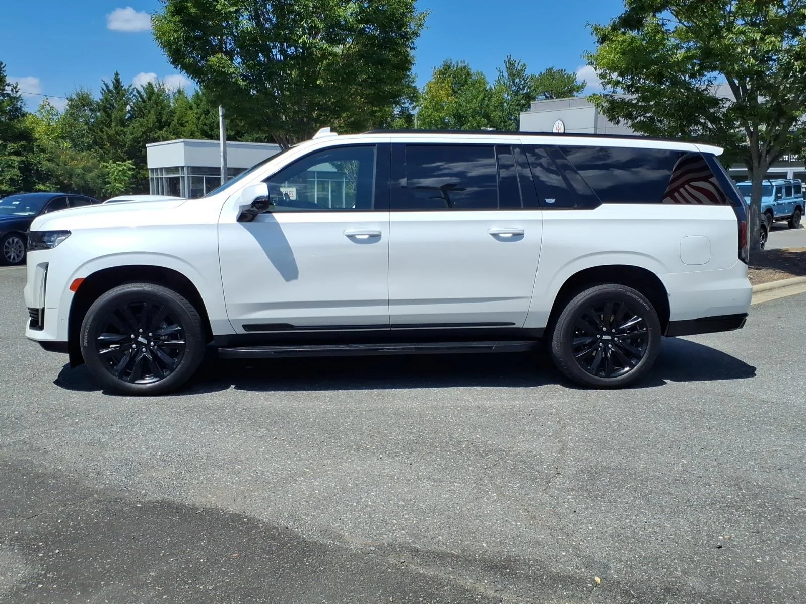 Used 2023 Crystal White Tricoat Cadillac 4WD Sport image 2