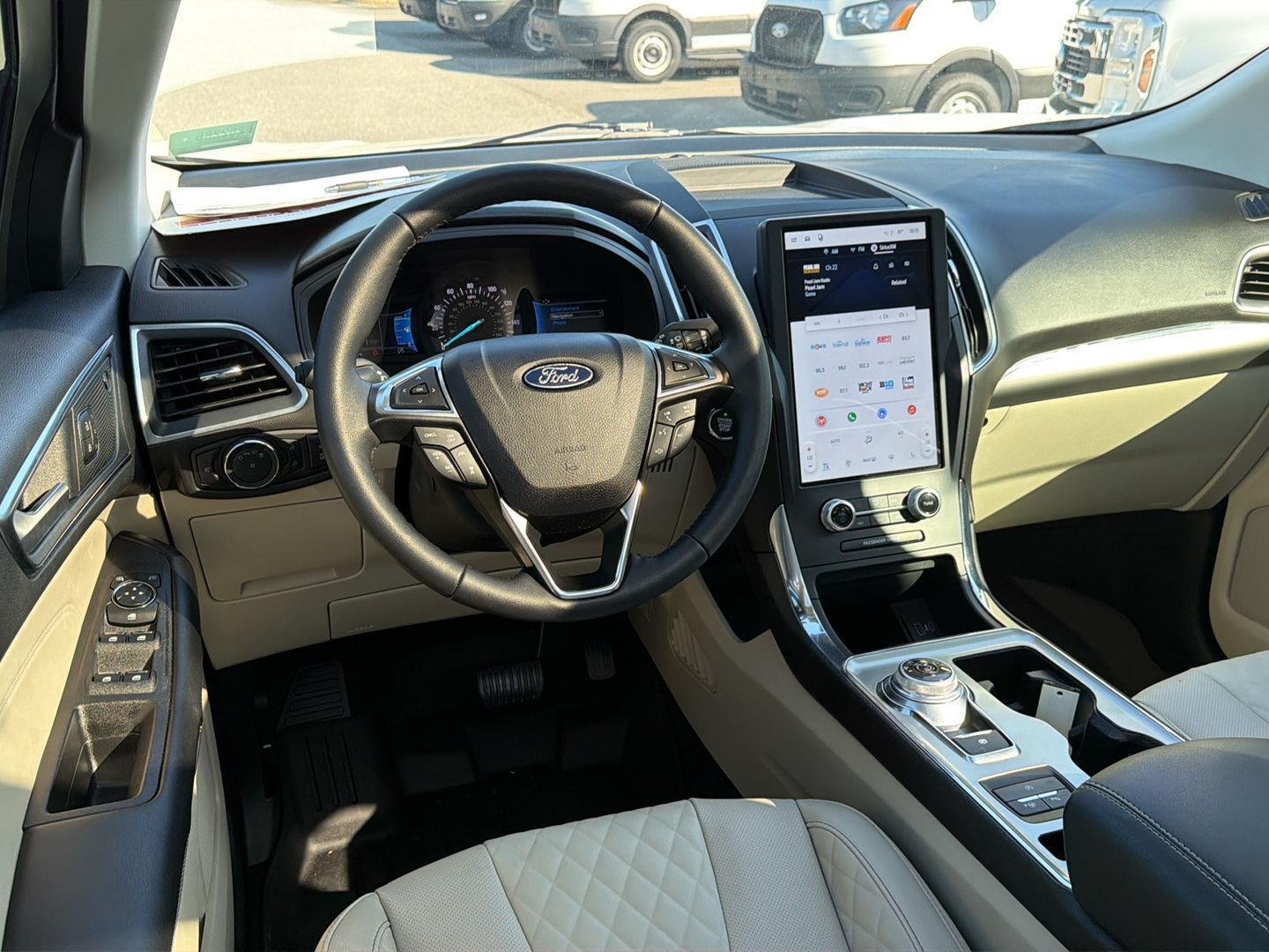 Used 2024 Star White Metallic Tri-Coat Ford Titanium image 19