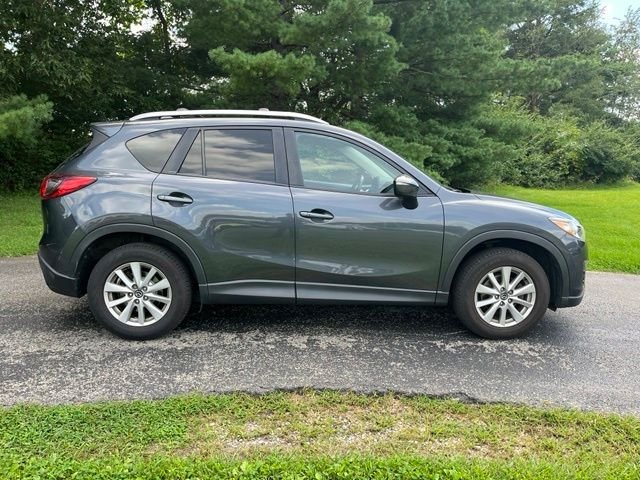 Used 2016 Mazda CX-5 Touring with VIN JM3KE4CY5G0748215 for sale in Xenia, OH