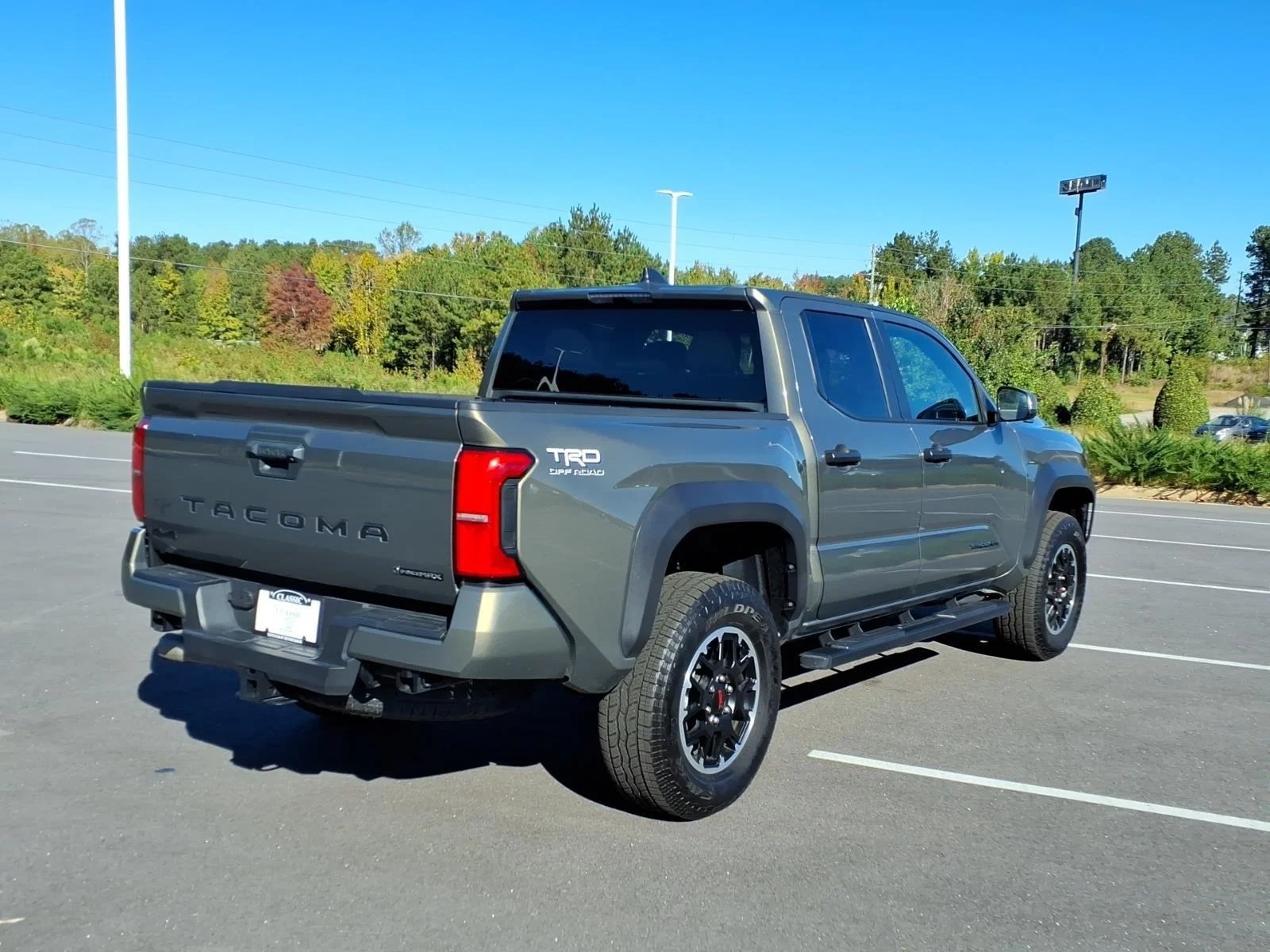 Used 2025 Bronze Oxide Toyota TRD Off Road Hybrid image 2