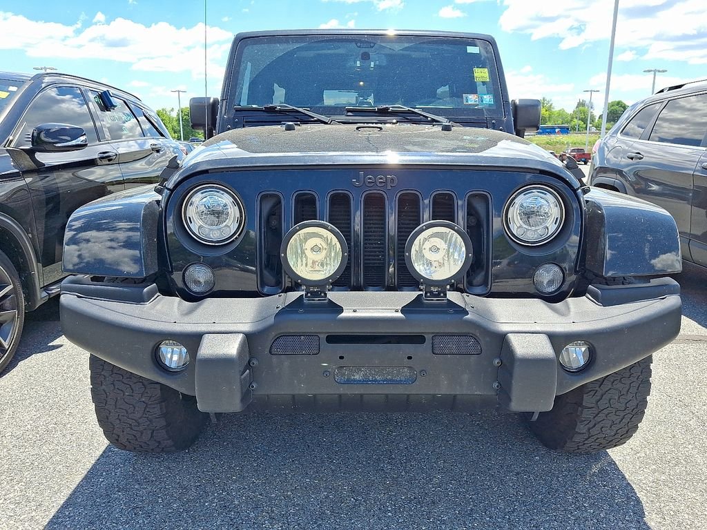 Used 2017 Black Jeep Unlimited Sahara image 2