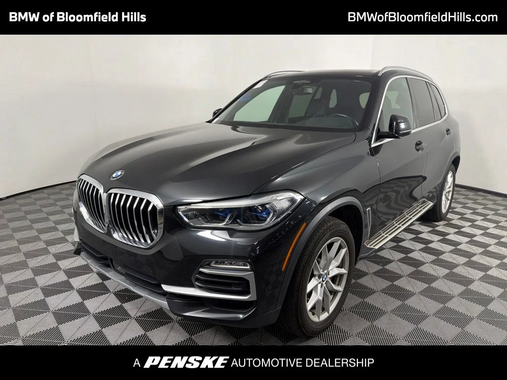 Used 2019 Black Sapphire Metallic BMW xDrive40i image 1