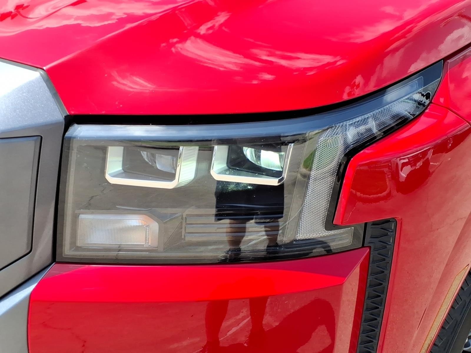 2026 Nissan Frontier SV Red at Robbins Nissan