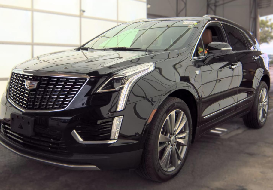 Used 2024 Black Cadillac Premium Luxury image 1
