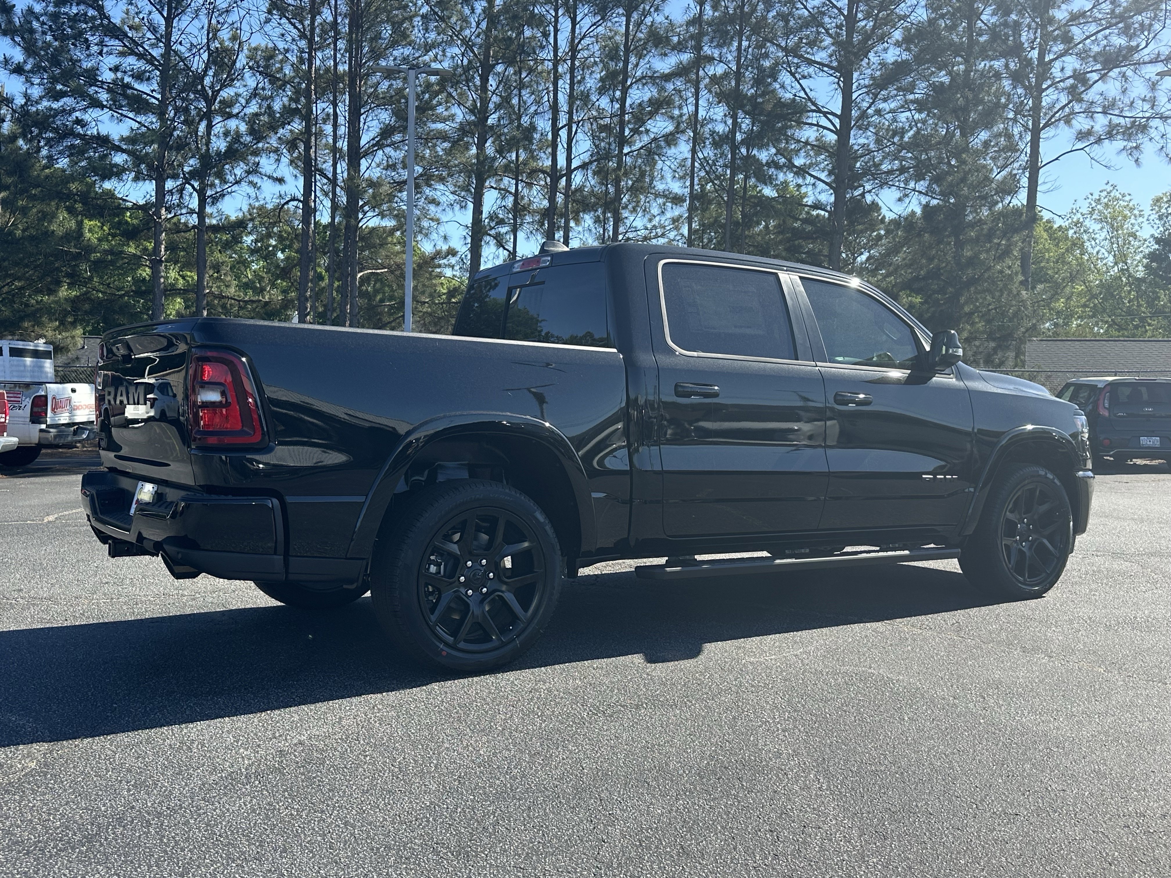 New 2026 Diamond Black Crystal Pearl-Coat Exterior Paint RAM Laramie image 8