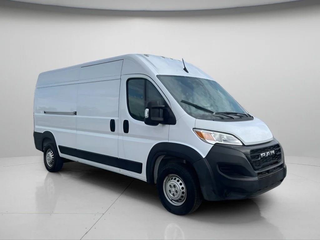Used 2025 Bright White Clearcoat Ram High Roof image 2