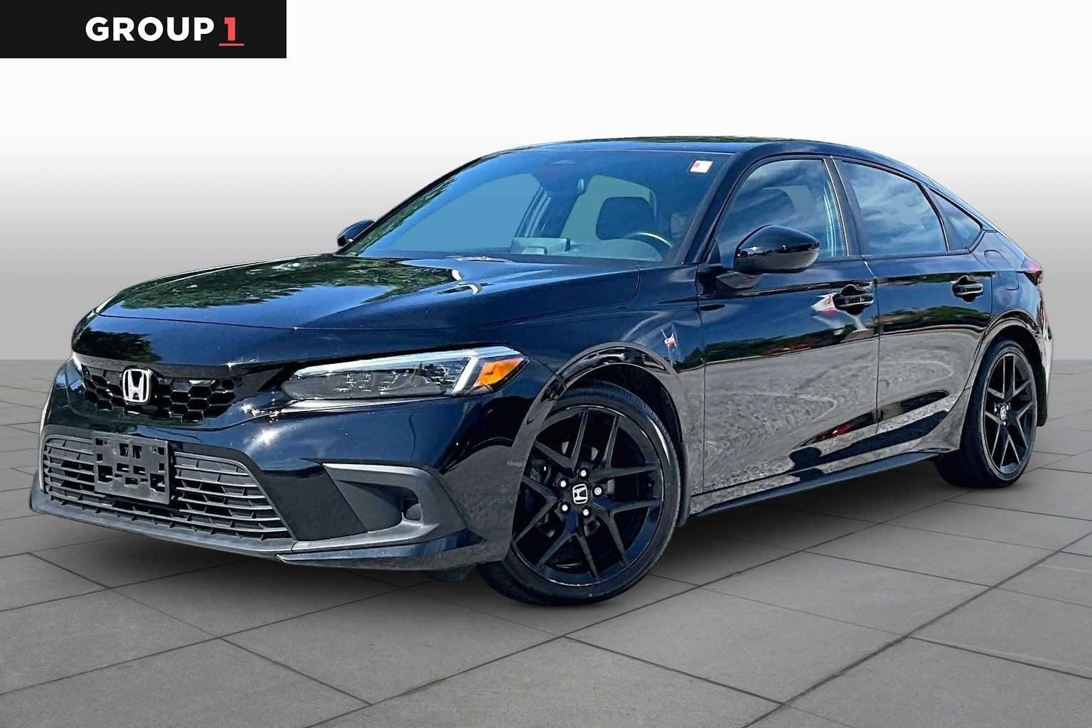 Used 2023 Crystal Black Pearl Honda Sport image 1