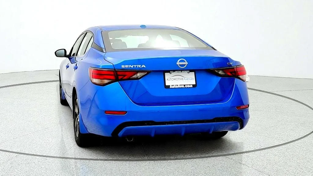 Used 2024 Electric Blue Metallic Nissan SV CVT image 6