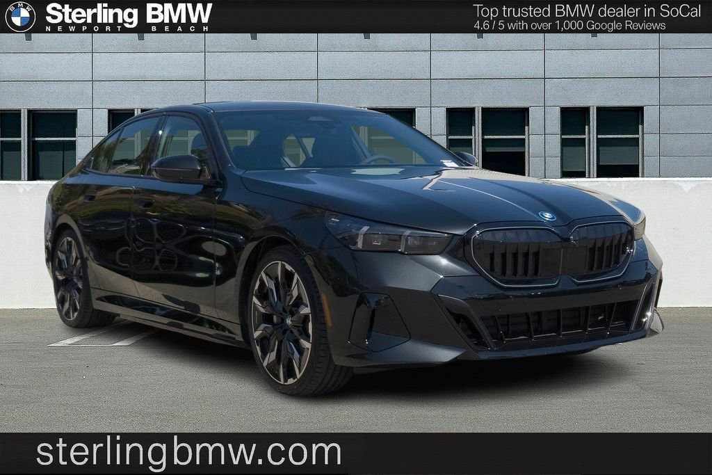 2026 BMW 5 Series 550e xDrive Sedan's photo