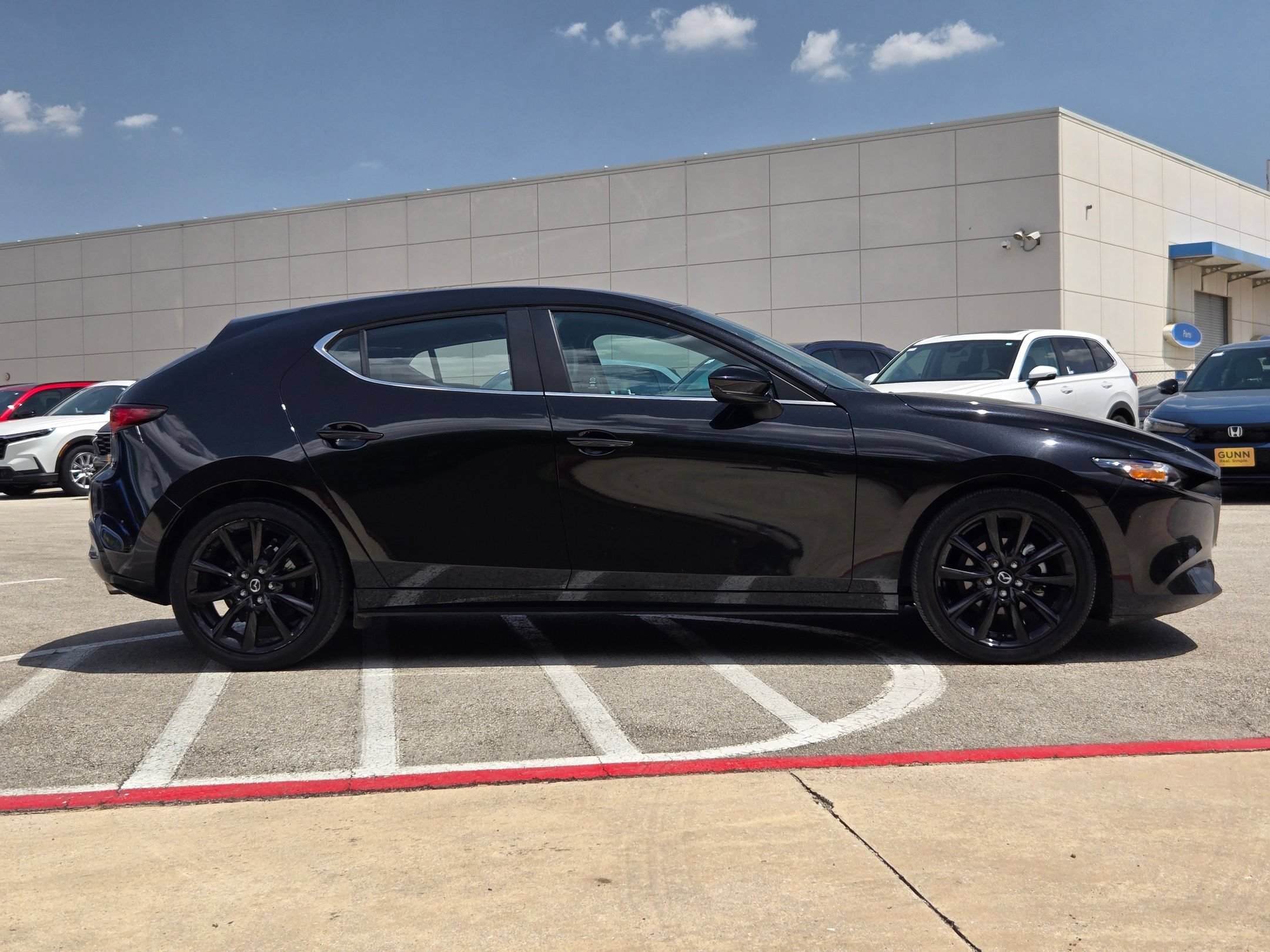 Used 2024 Jet Black Mica Mazda 2.5 S Select Sport image 2