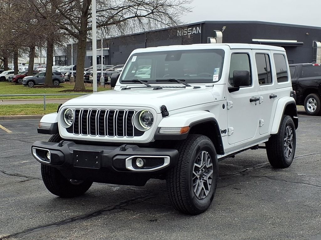 Used 2025 Jeep Wrangler 4-Door Sahara with VIN 1C4PJXEN7SW546707 for sale in Kansas City
