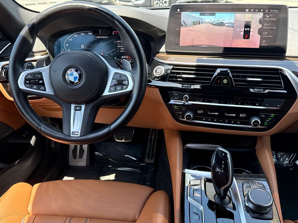 Used 2023 Black BMW M550i xDrive image 21