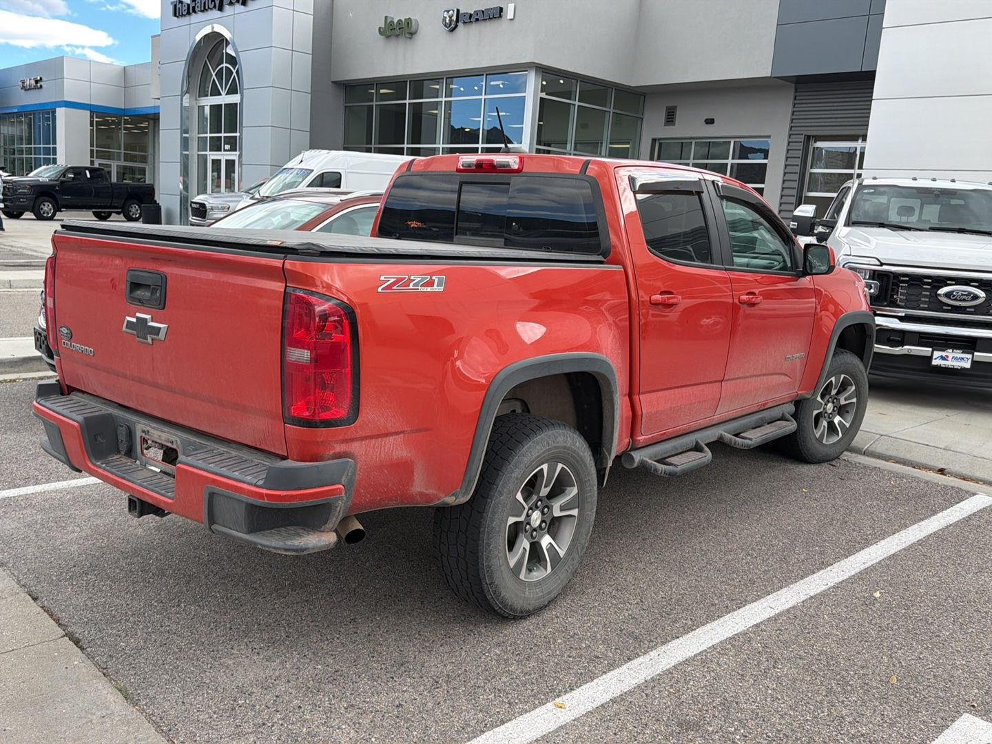 Used 2016 Inferno Orange Metallic Chevrolet 4WD Z71 image 3