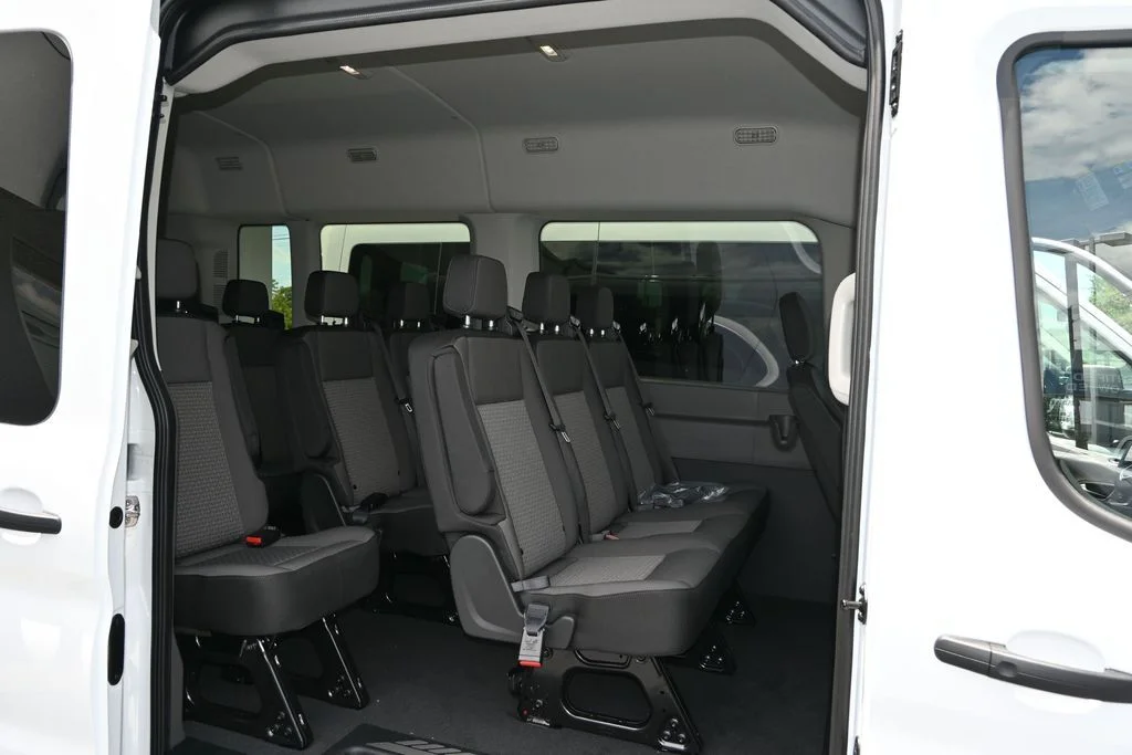 New 2026 Oxford White Ford Passenger Van XLT image 13