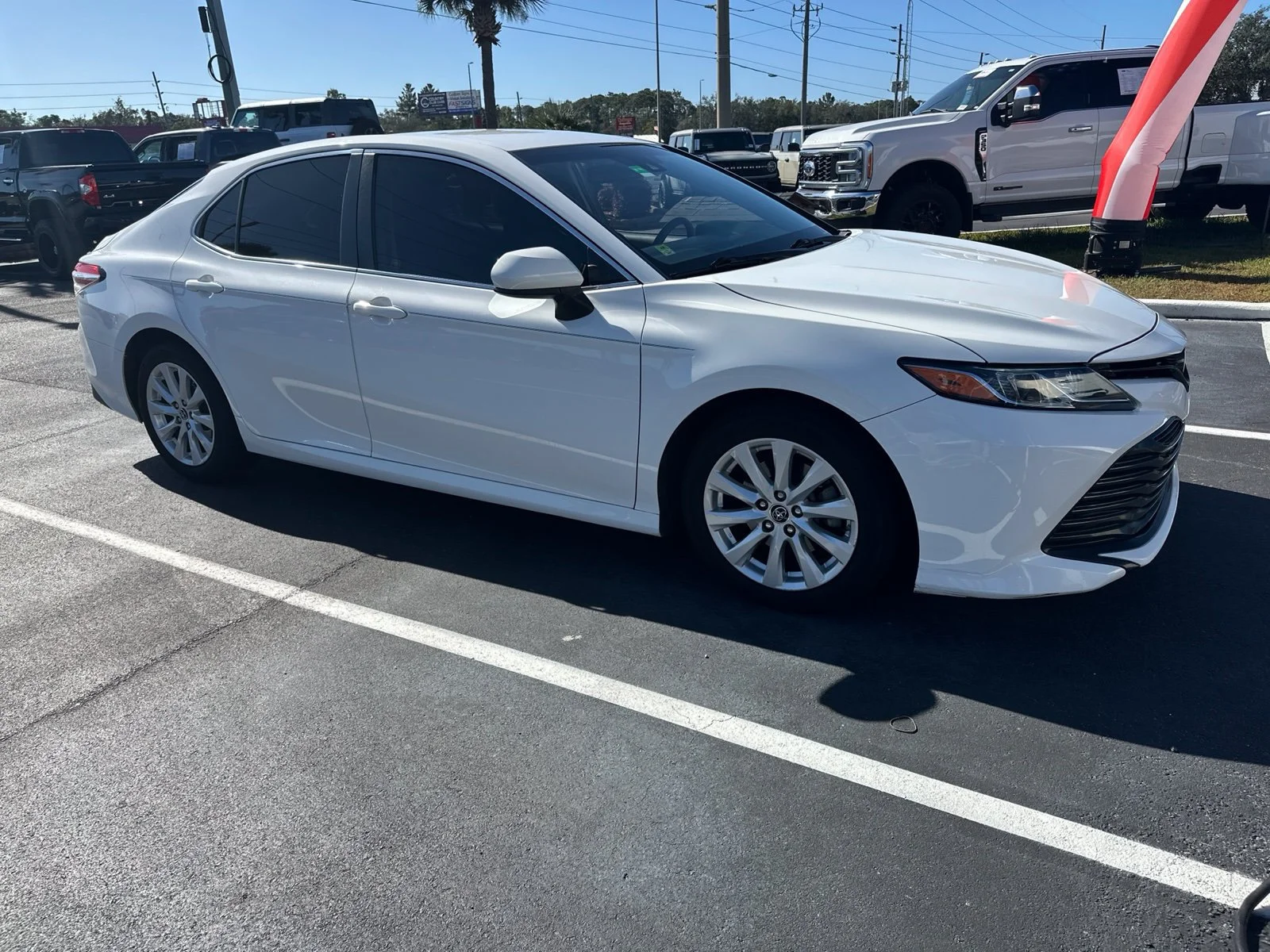 Used 2018 White Toyota LE image 1