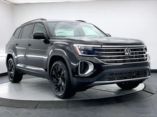 New 2026 Black Volkswagen SE w/Technology image 1