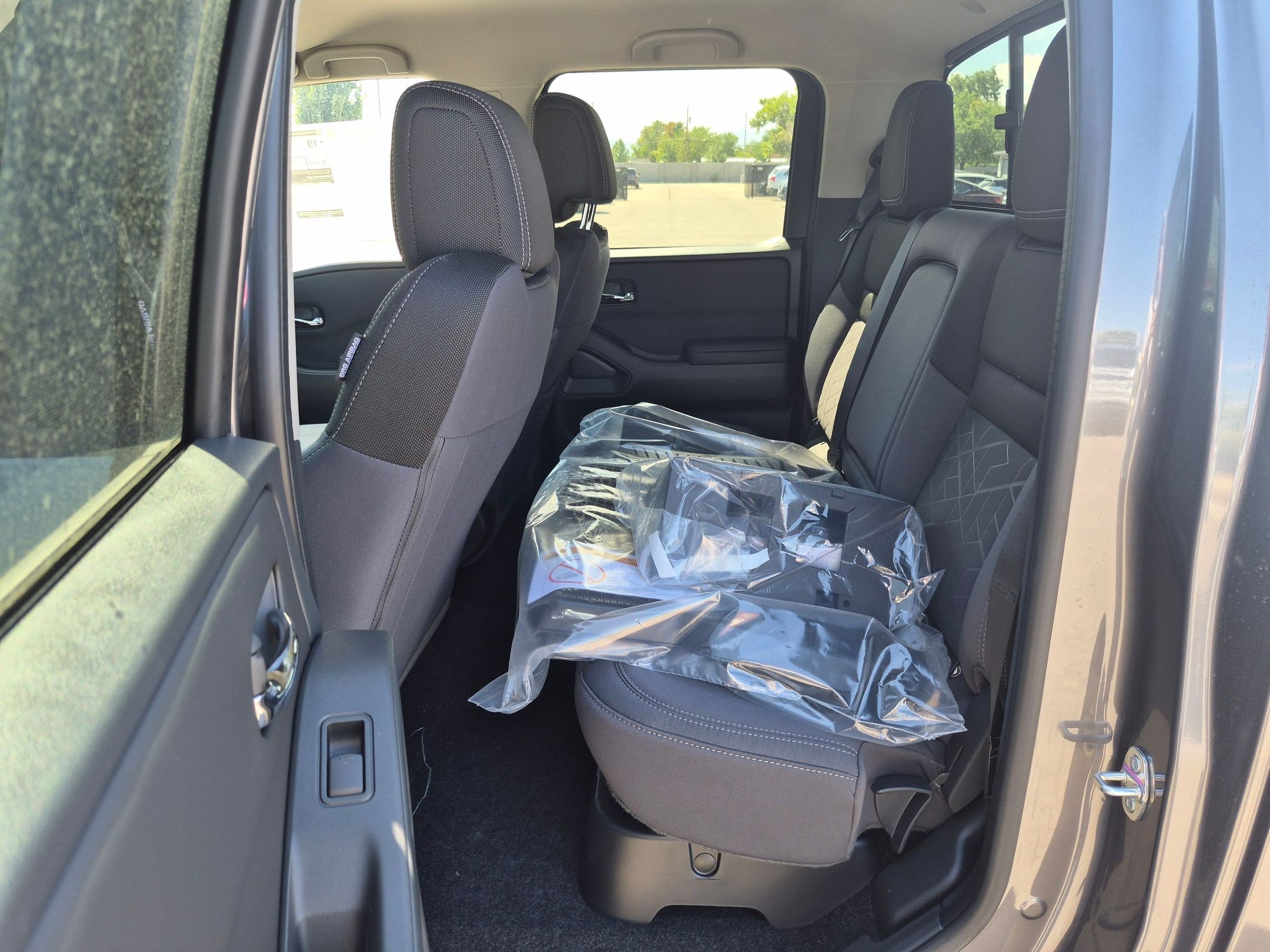 New 2026 Gun Metallic Nissan Crew Cab SV image 14