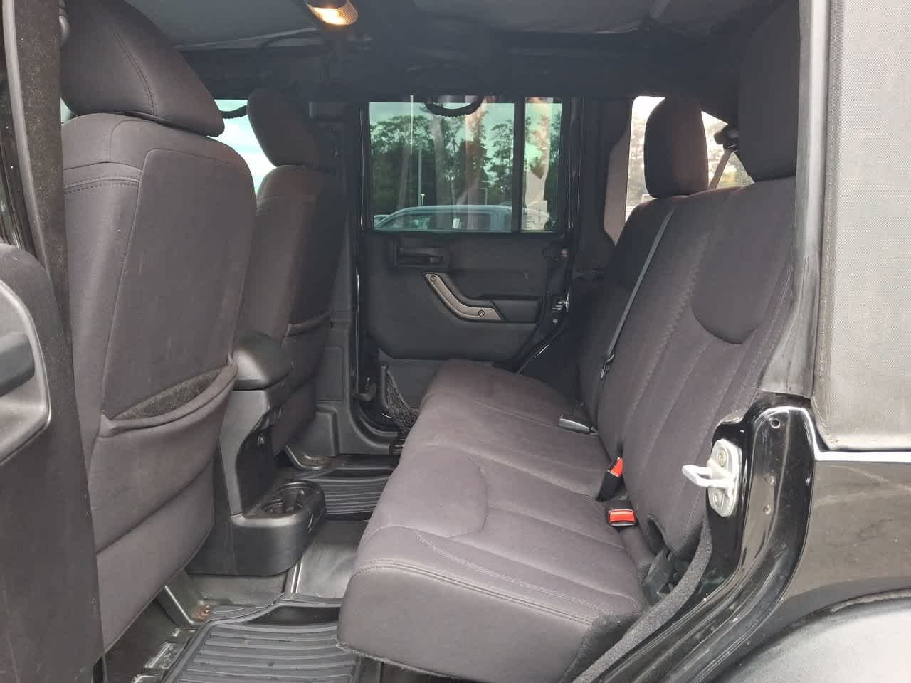 Used 2013 Black Clearcoat Jeep Sport image 25