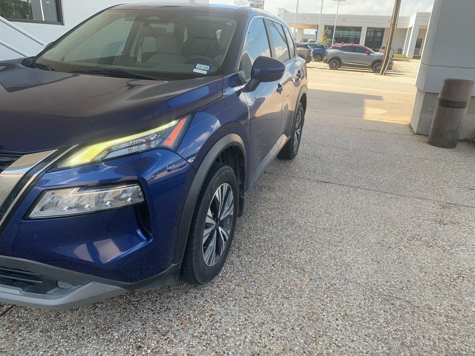 Used 2022 Caspian Blue Metallic Nissan SV image 4
