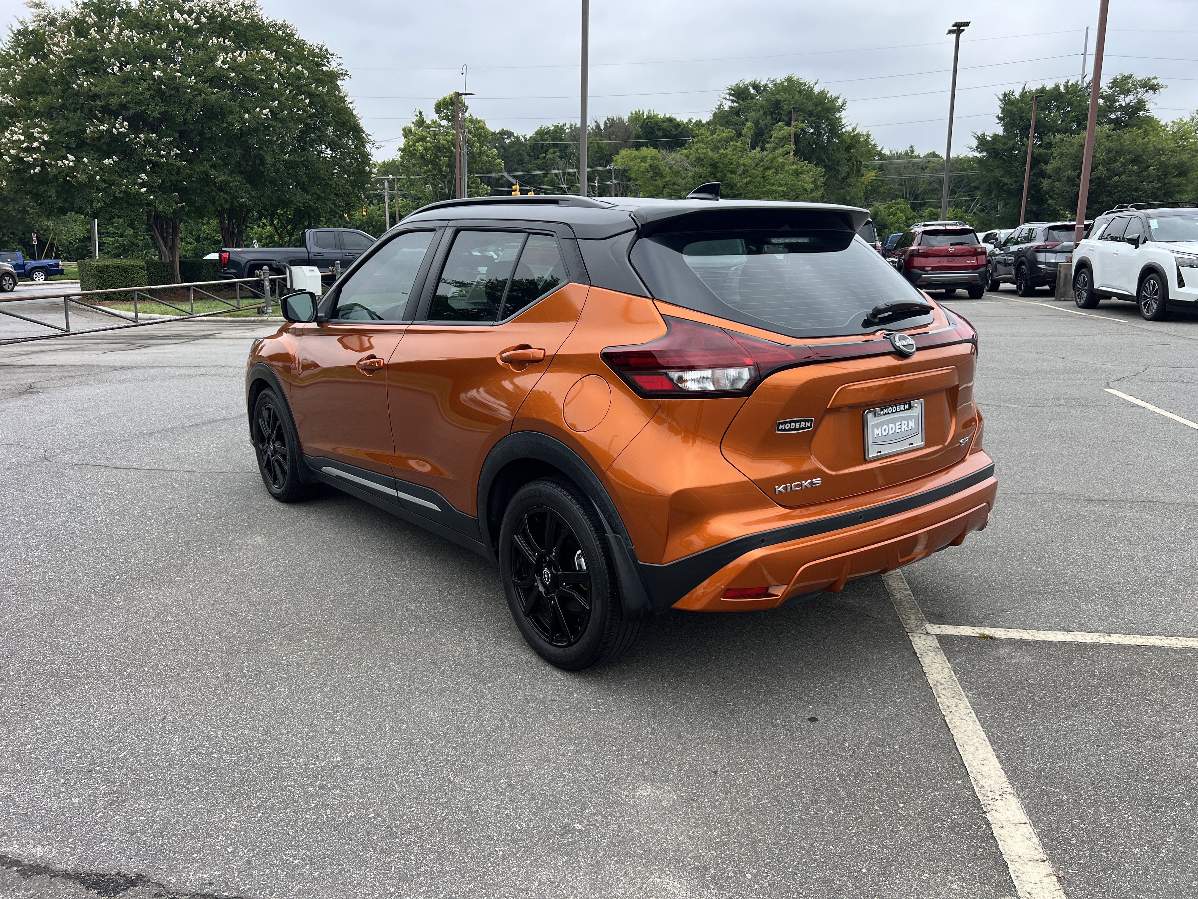 Certified Used 2023 Monarch Orange Metallic/Super Black Nissan SR image 7
