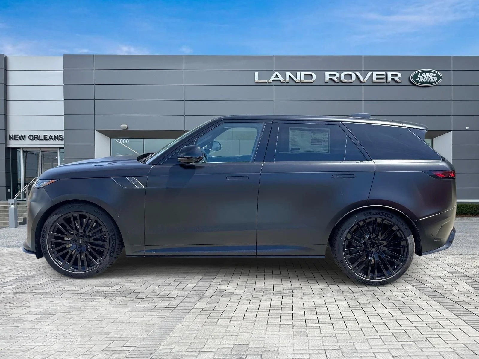 New 2026 Obsidian Black Satin Land Rover SV image 2
